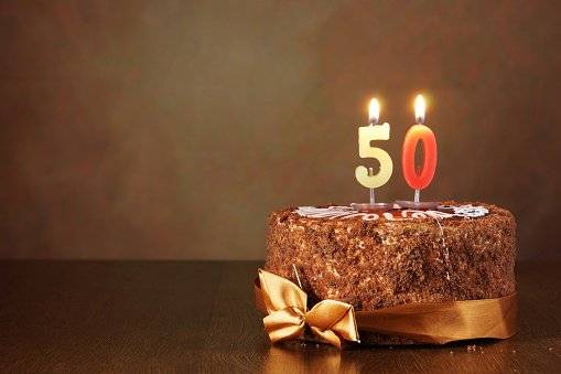 Chocolate Cake where the candles are the number 50
