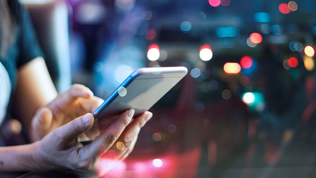 person checking pictures on their phone